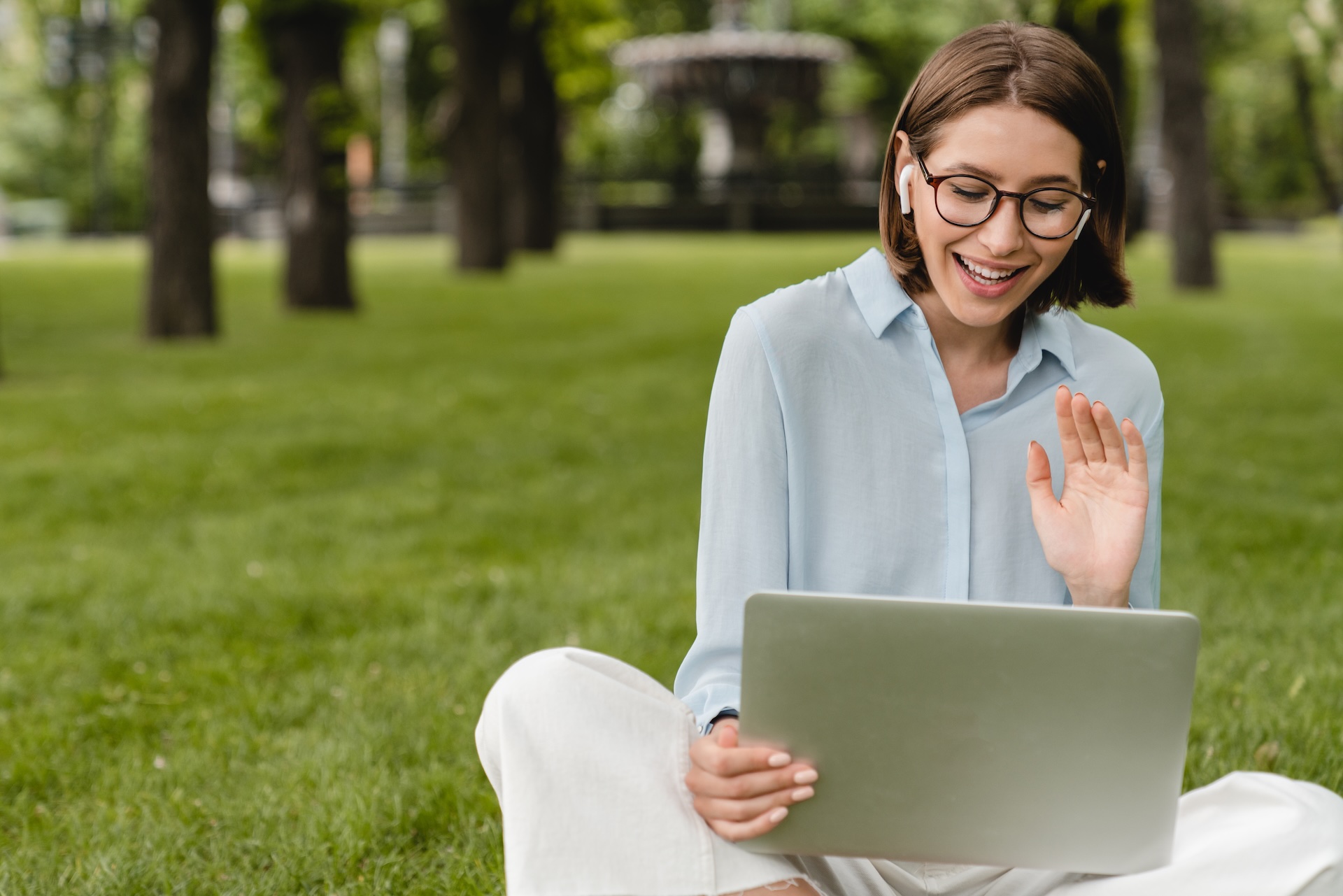 Young caucasian student businesswoman girl talking having video call conversation online on laptop